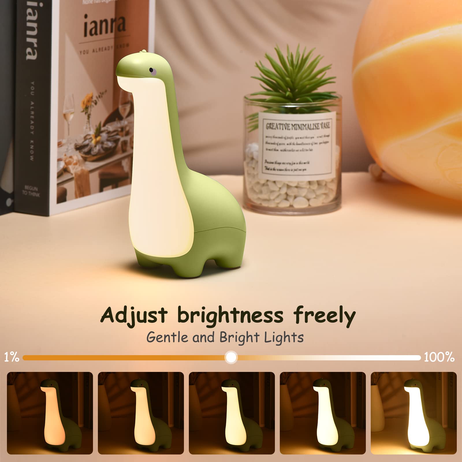 Ligitive dinosaur night light on table; kid-friendly nursery decor idea