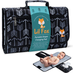 Lil Fox baby changing pad open demonstrates one-handed ease for quick diaper changes.