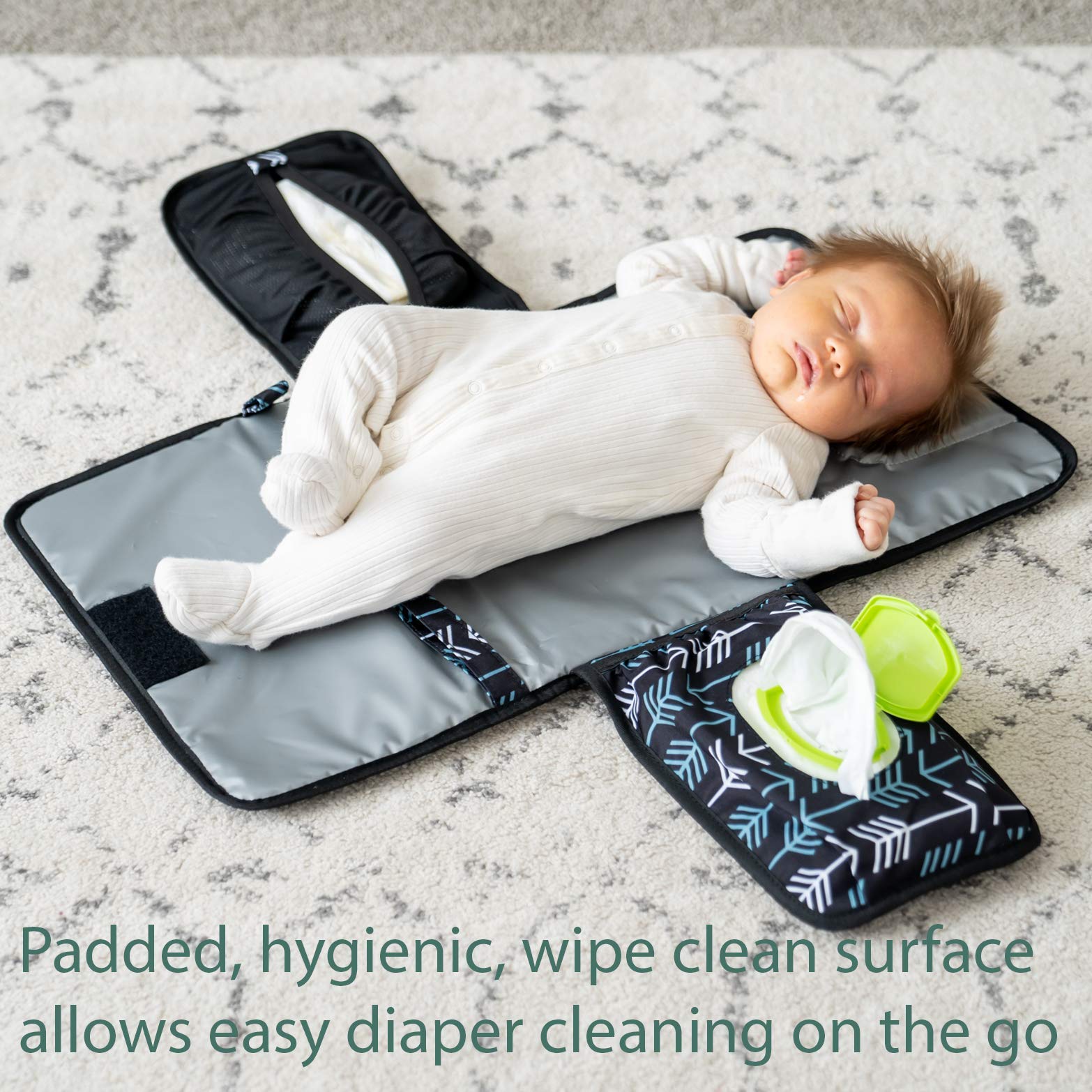 Lil Fox change pad with 100-pack wipes pocket keeps wipes within reach during diaper changes.