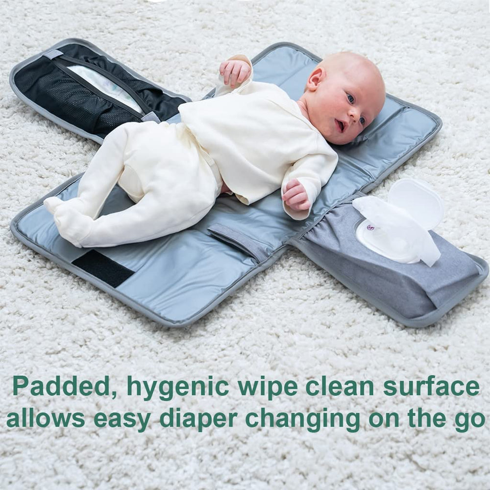 Lil Fox changing pad pocket holds multiple diapers for on-the-go use.