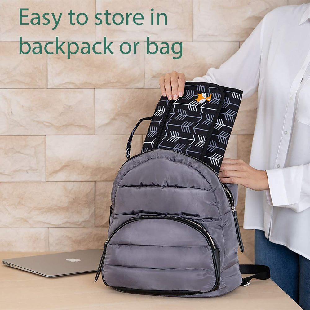 Lil Fox diaper clutch strap attaches to strollers for easy access.