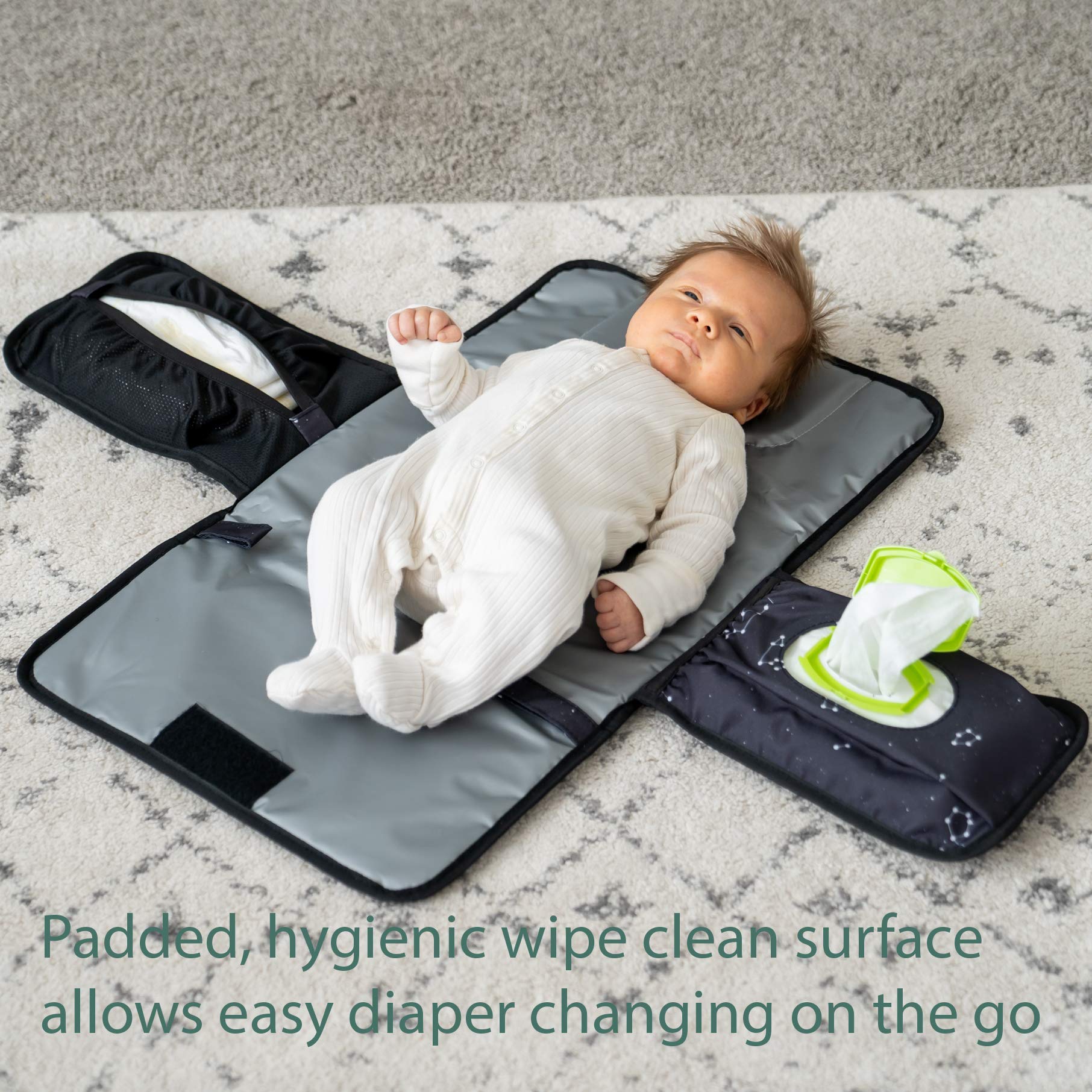 Lil Fox portable changing pad open layout shows organized pockets for on-the-go changes