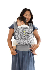LILLEbaby Complete Airflow front-facing carrier provides ergonomic support for tiny infants during exploration.