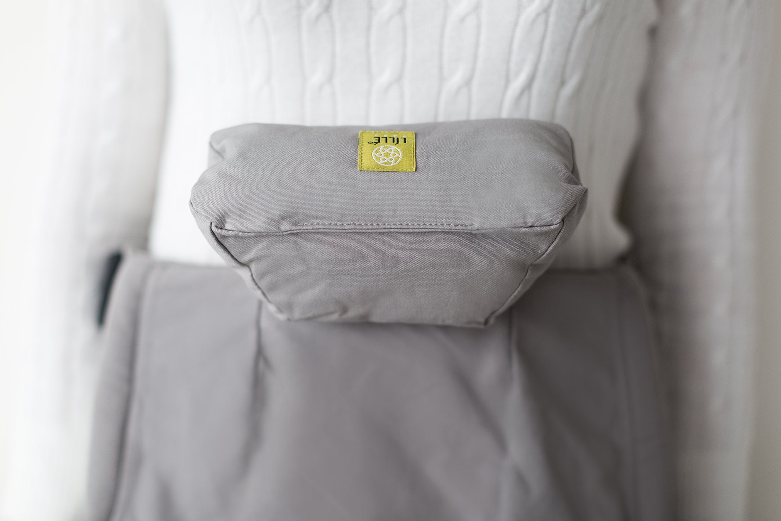 LILLEbaby cushion removed from carrier shows washable, quick-dry fabric and care.