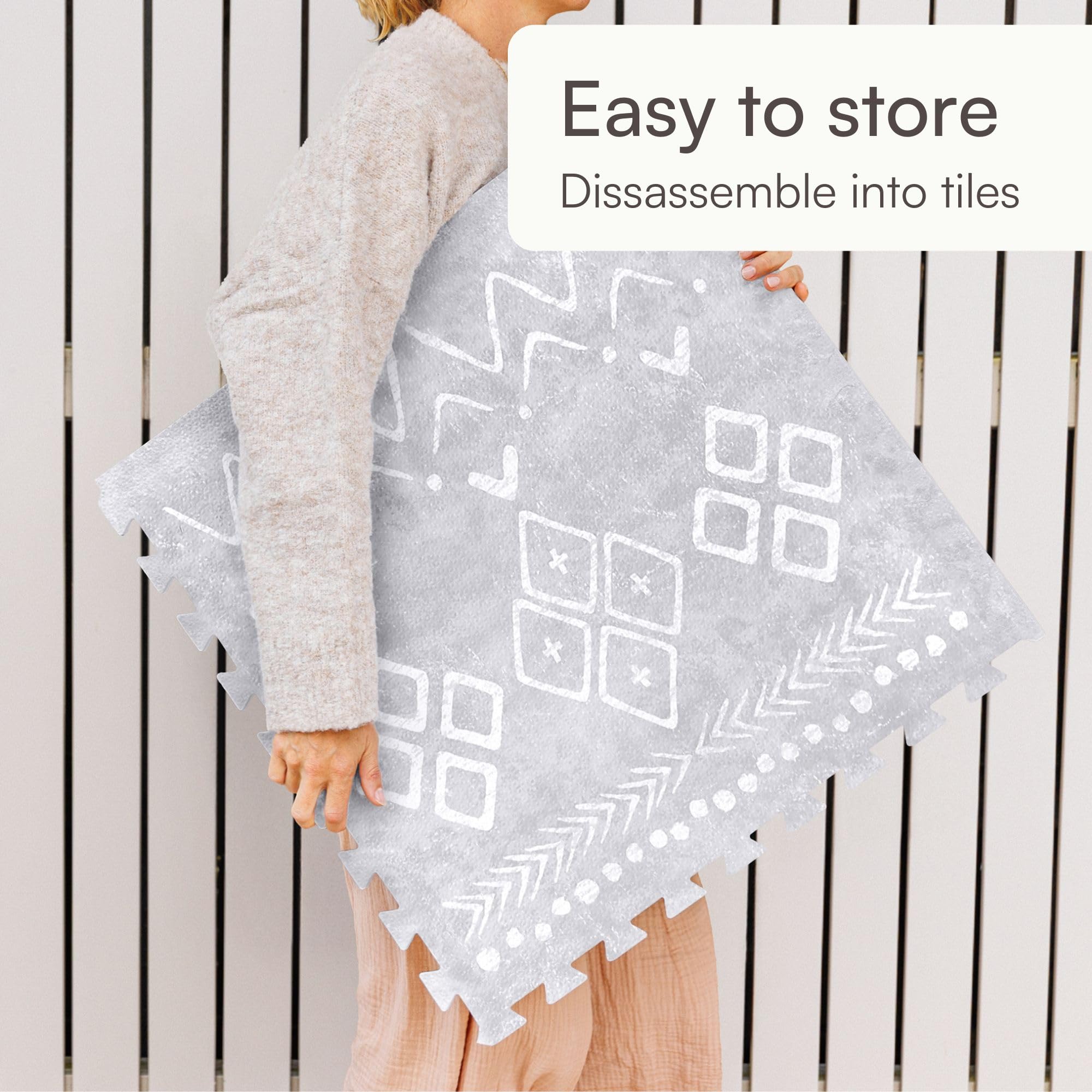 Lillefolk baby play mat gray padding helps protect tiny knees during playtime.