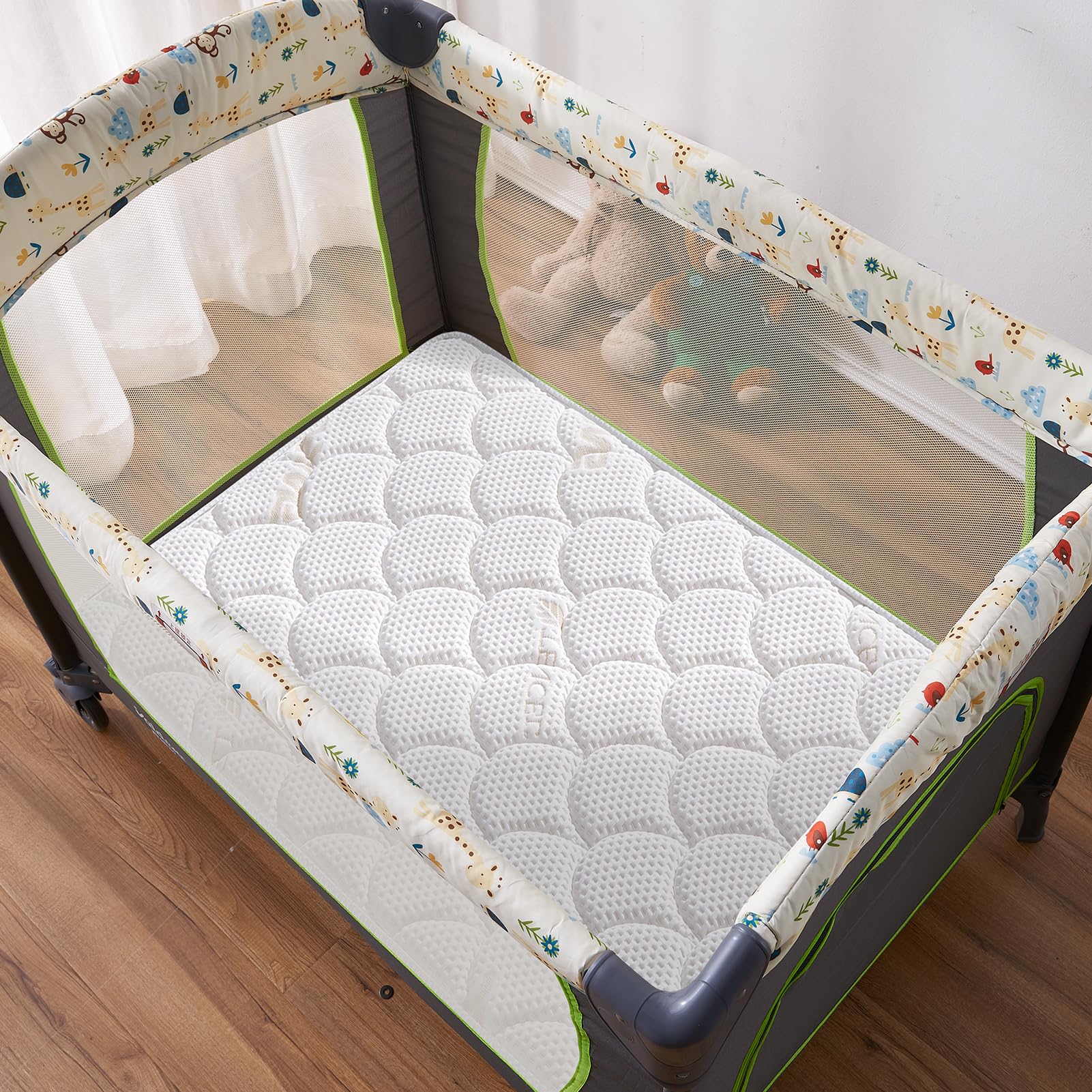 Lillibearas Pack N Play Topper fit-no-gaps view across playard corners.