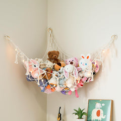 Lilly's Love macrame hammock with lights in a corner storage setup for cozy ambiance