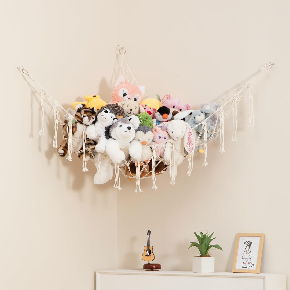 Lilly's Love macrame hammock closeup demonstrates sturdy knots for stylish toy storage.