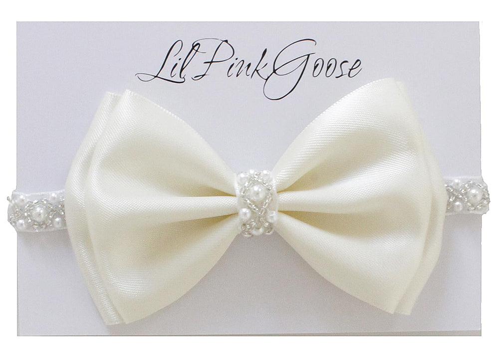 LilPinkGoose baby baptism headband in white satin bow with pearl rhinestones for christening photos.