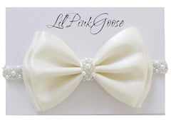 LilPinkGoose baby baptism headband in white satin bow with pearl rhinestones for christening photos.