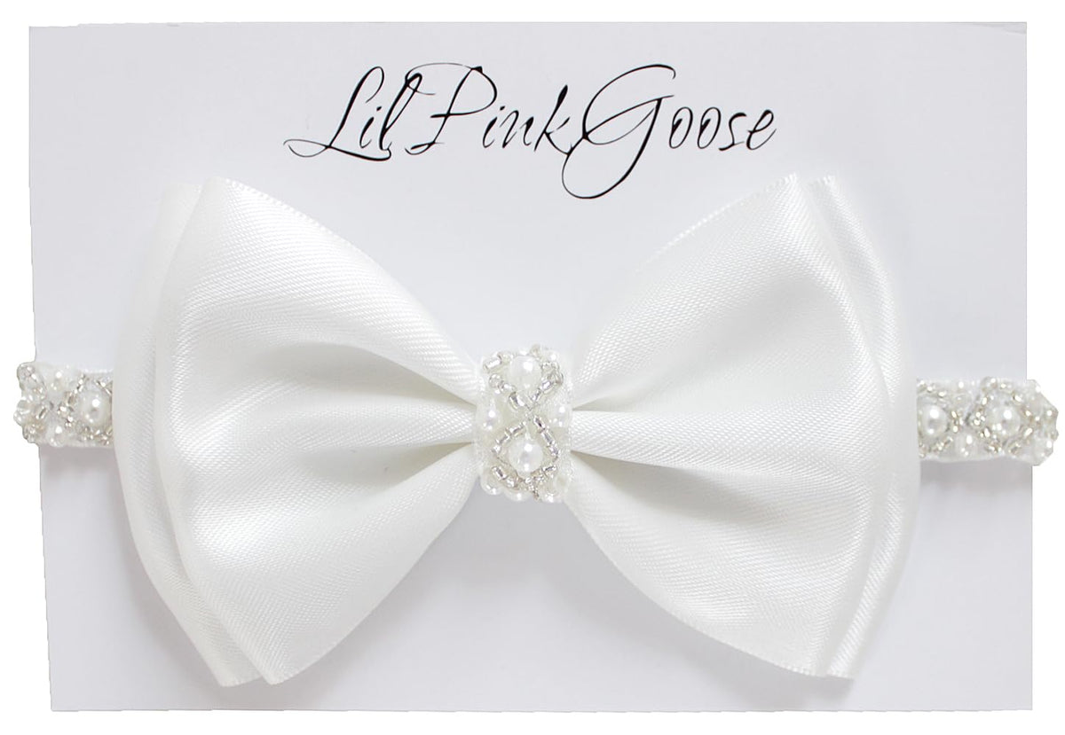 LilPinkGoose baptism headband with pearl rhinestone bow for christening ceremonies.