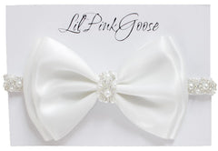 LilPinkGoose baptism headband with pearl rhinestone bow for christening ceremonies.