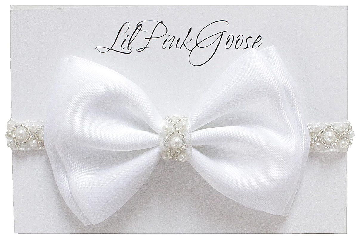LilPinkGoose baptism headband with satin bow and pearl rhinestones for christening photos.