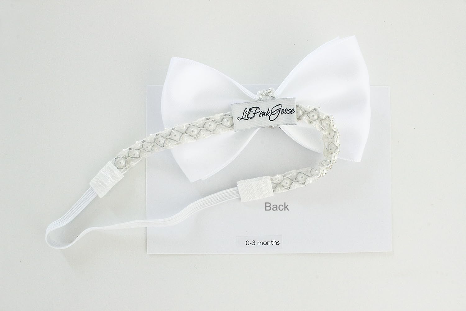 LilPinkGoose headband white pearl band closeup showcases delicate craft.