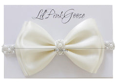 LilPinkGoose pearl rhinestone band adds delicate sparkle to newborn looks.