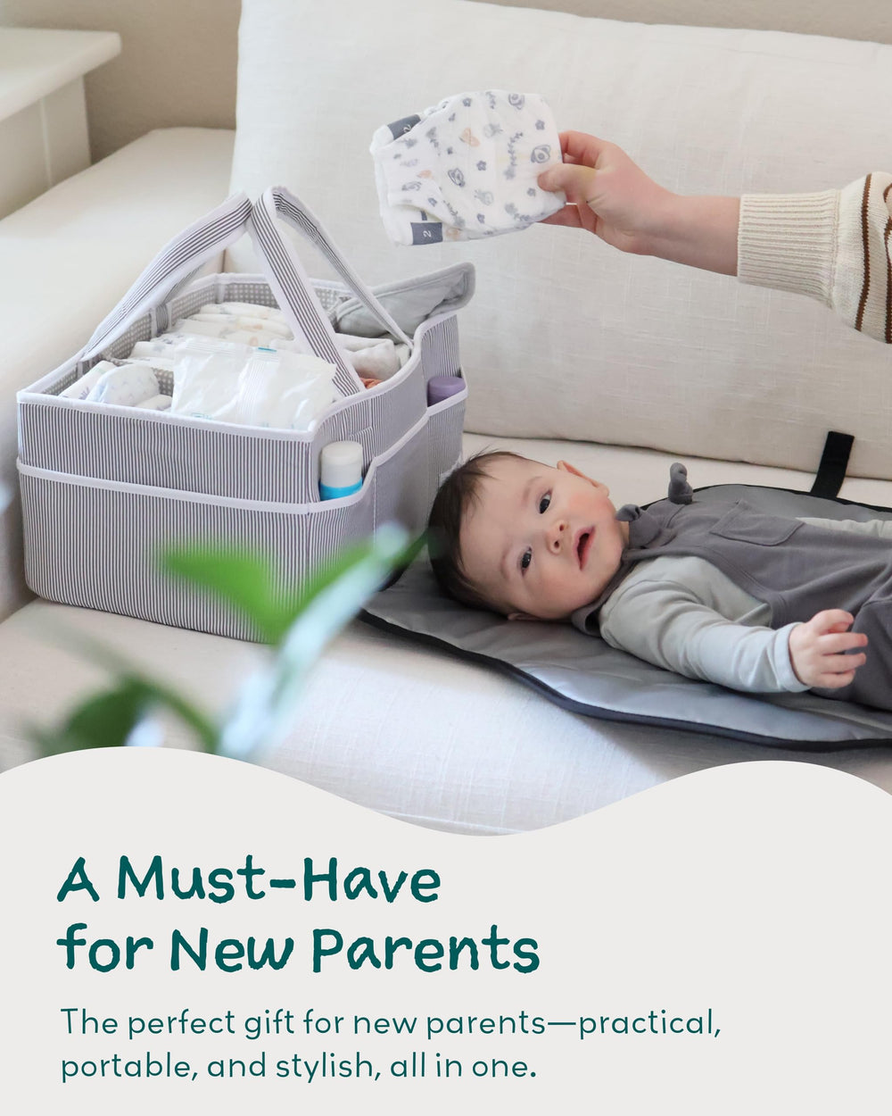 Lily Miles diaper caddy gray on-changing-table use creates a tidy nursery setup.
