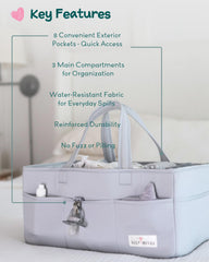 Lily Miles caddy 9-pocket layout keeps diapers and creams neatly organized.