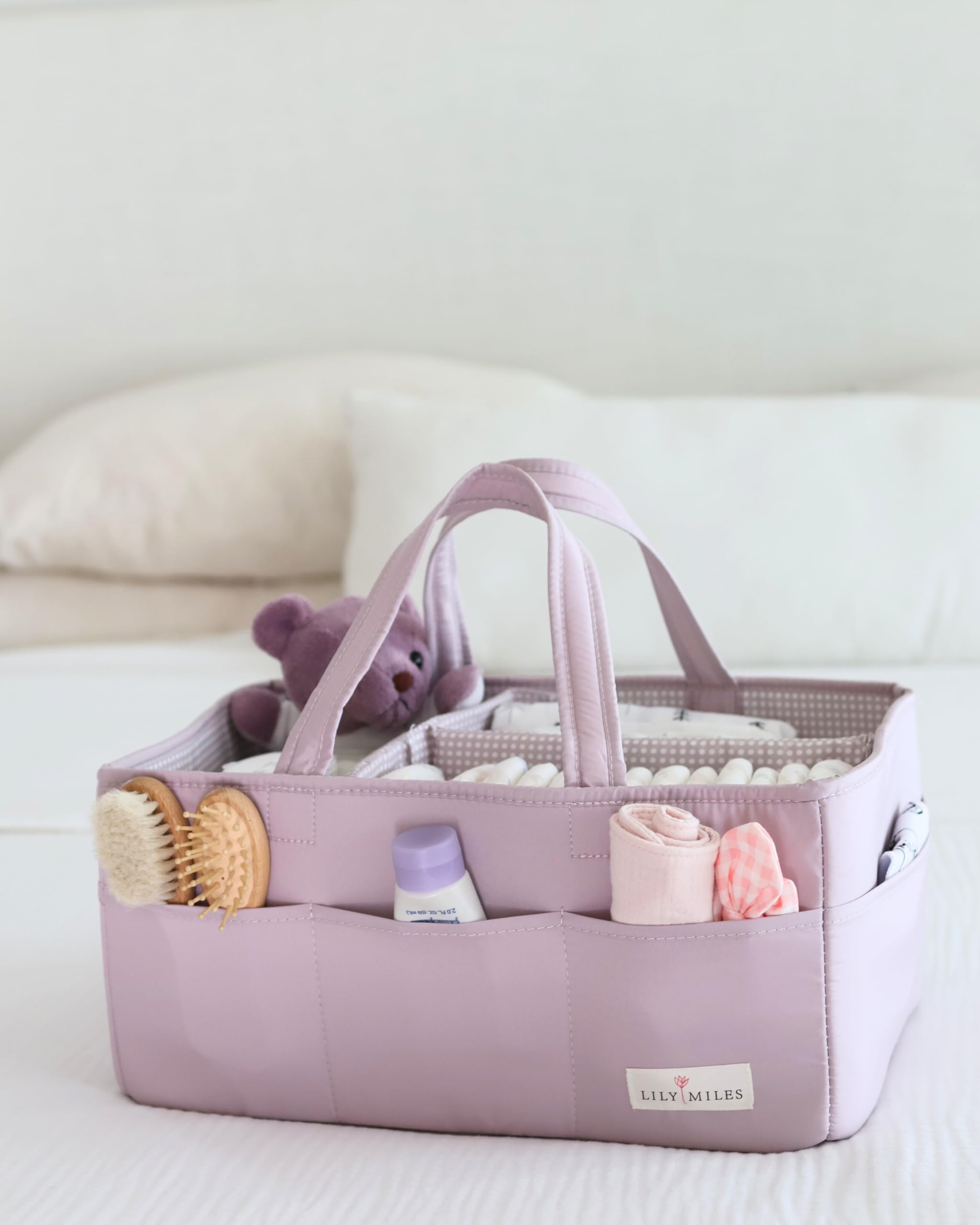 Lily Miles large-capacity caddy stores toys and outfits beyond diapers.