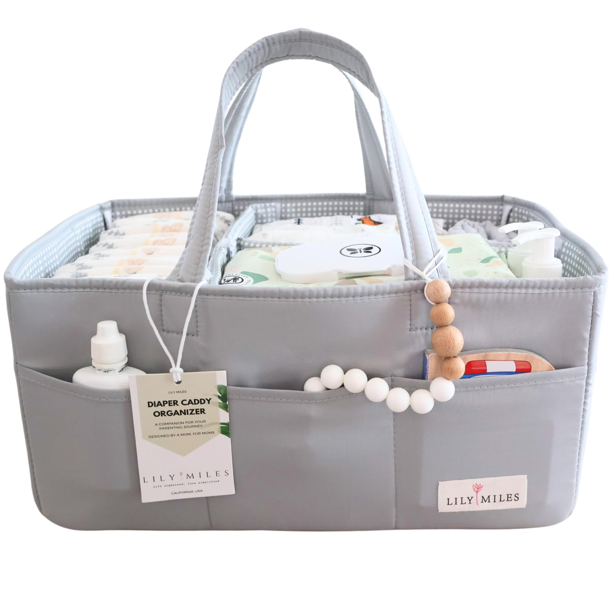 Lily Miles diaper caddy organizer front view shows spacious pockets for essentials.