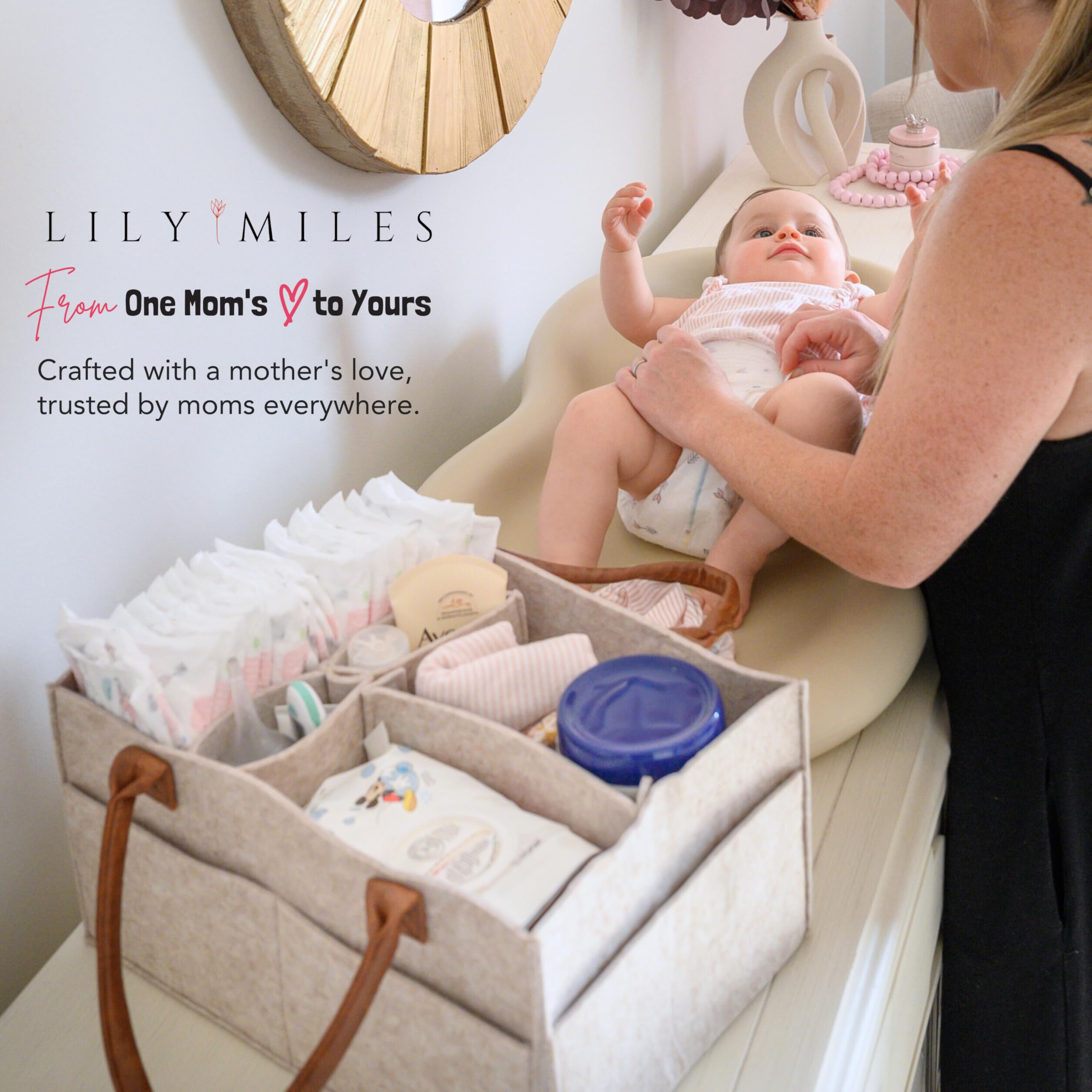 Lily Miles diaper caddy organizer quilted handles emphasize soft-touch luxury with strong grip.