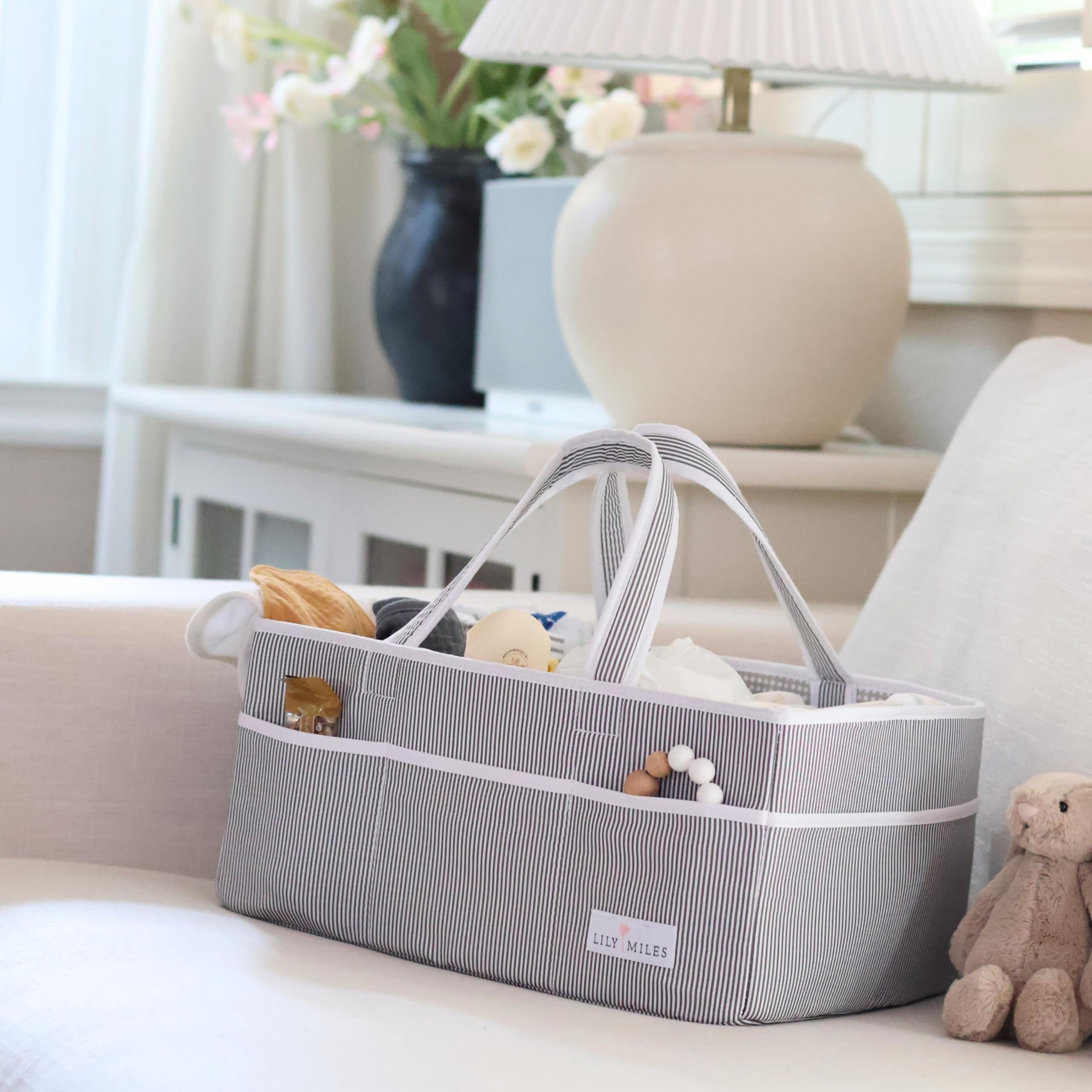 Lily Miles diaper caddy with water-resistant lining easy to wipe clean.
