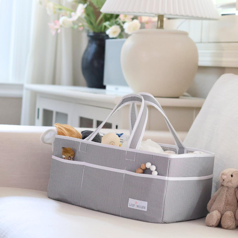 Lily Miles diaper caddy with water-resistant lining easy to wipe clean.