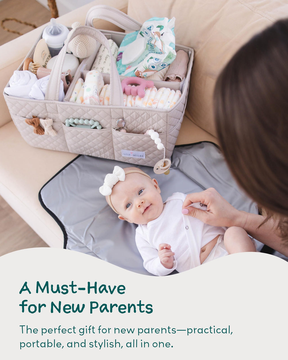 Lily Miles portable baby organizer shown at bedside for nighttime routines.