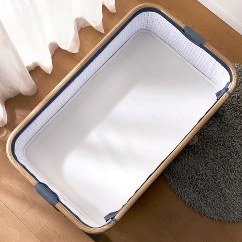 LILYVIBEBEARHAPPY bassinet mattress foam-inside demonstrates firm support.