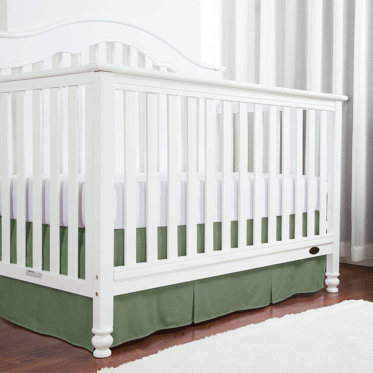 Linens Limited 14-inch drop detail ensures easy crib bedskirt fitting