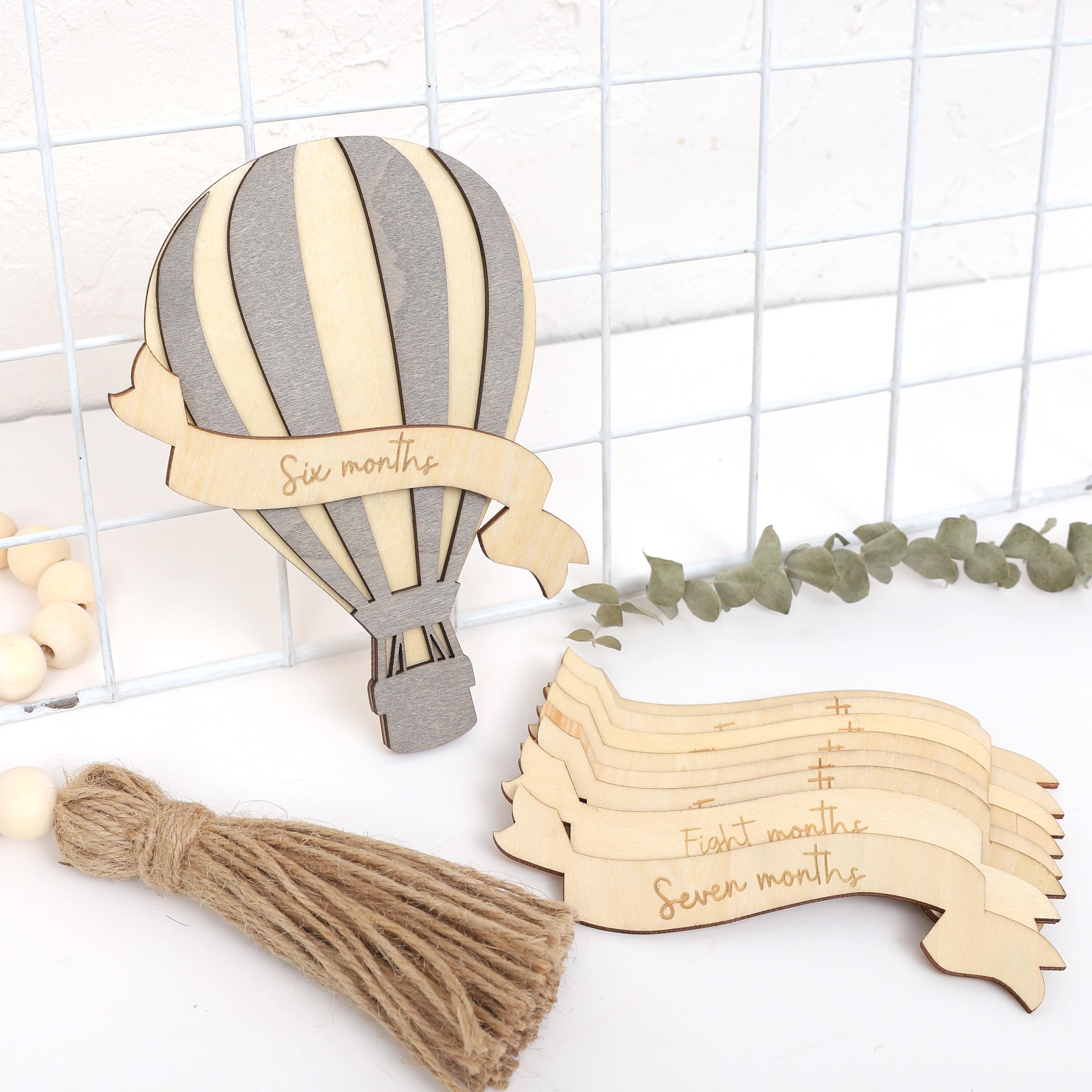 LINLULU boho balloon sign in natural colors, complements any nursery theme.