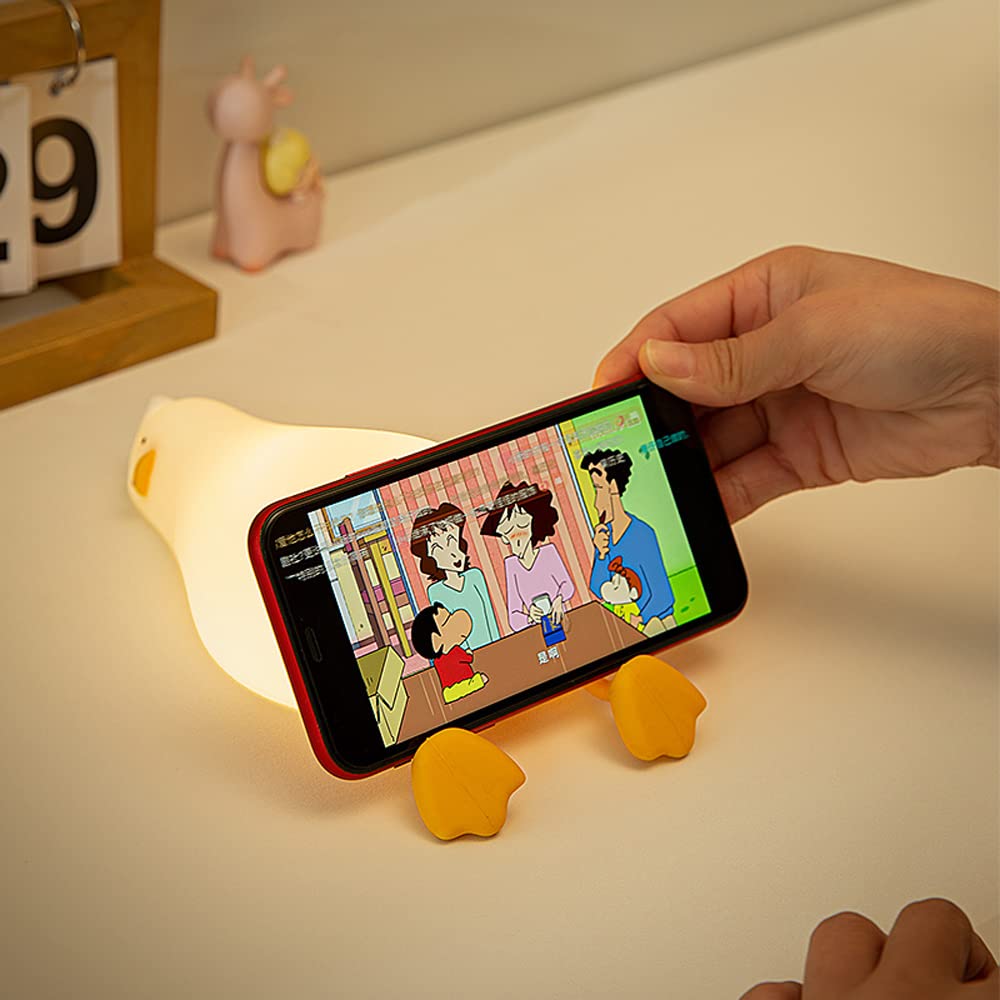 Liqmin Duck Night Light showing soft glow in nursery for calming playtime