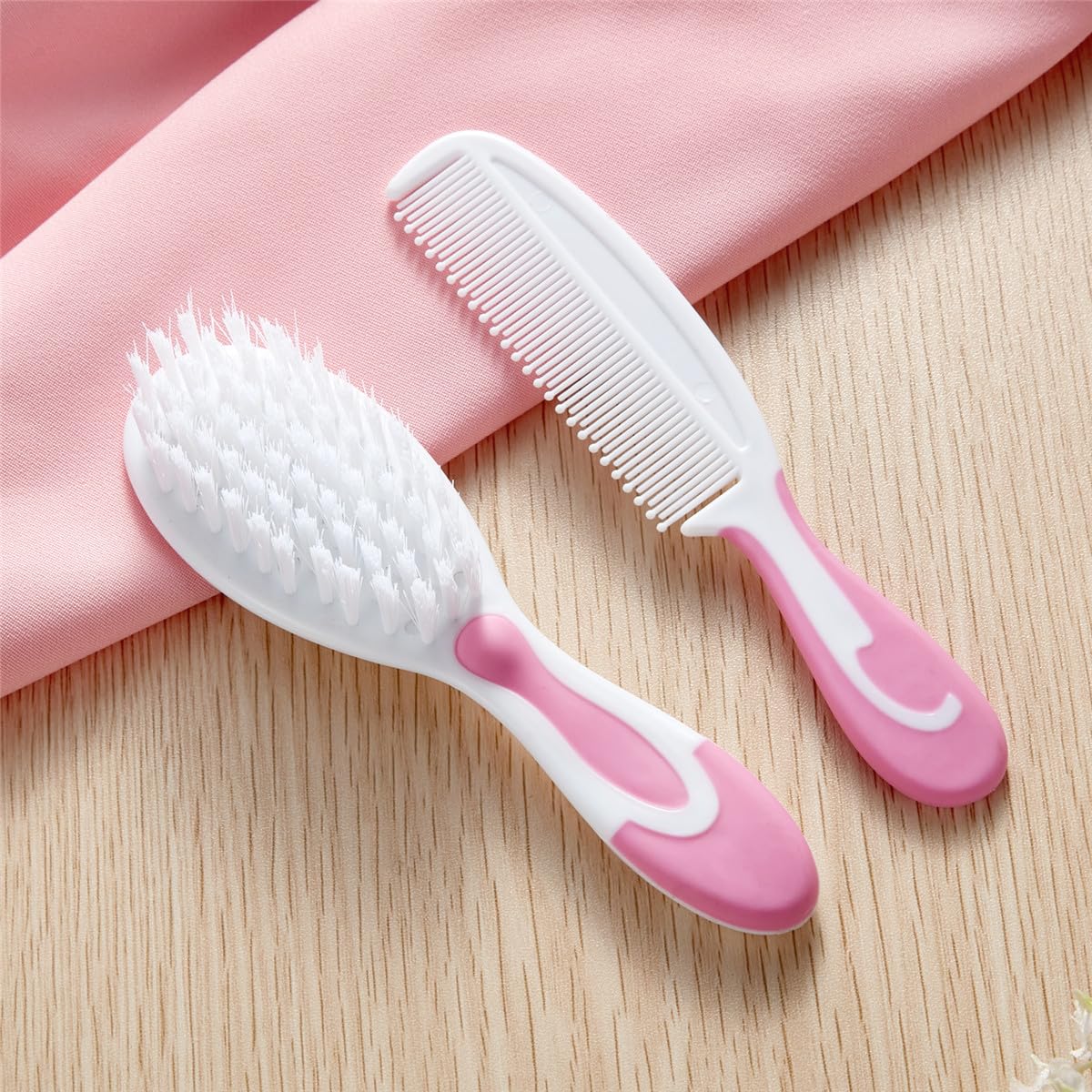 Little Angel baby comb with rounded teeth for safe detangling.