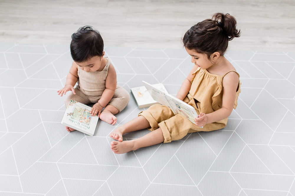 LITTLE Bot Ofie mat reversible sides show two stylish looks for home décor