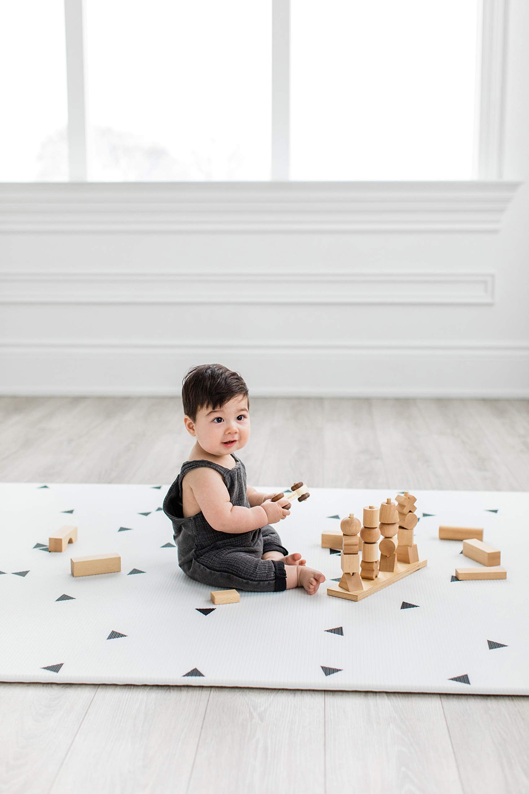 LITTLE Bot Ofie Mat roll-up storage feature keeps play space tidy.