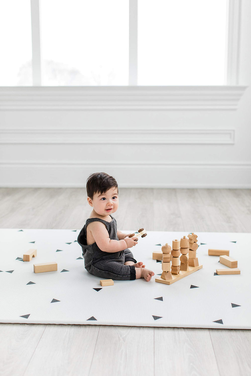 LITTLE Bot Ofie Mat roll-up storage feature keeps play space tidy.