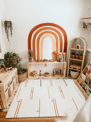 Little Bot Ofie mat rolled for storage offers easy cleanup and space saving.