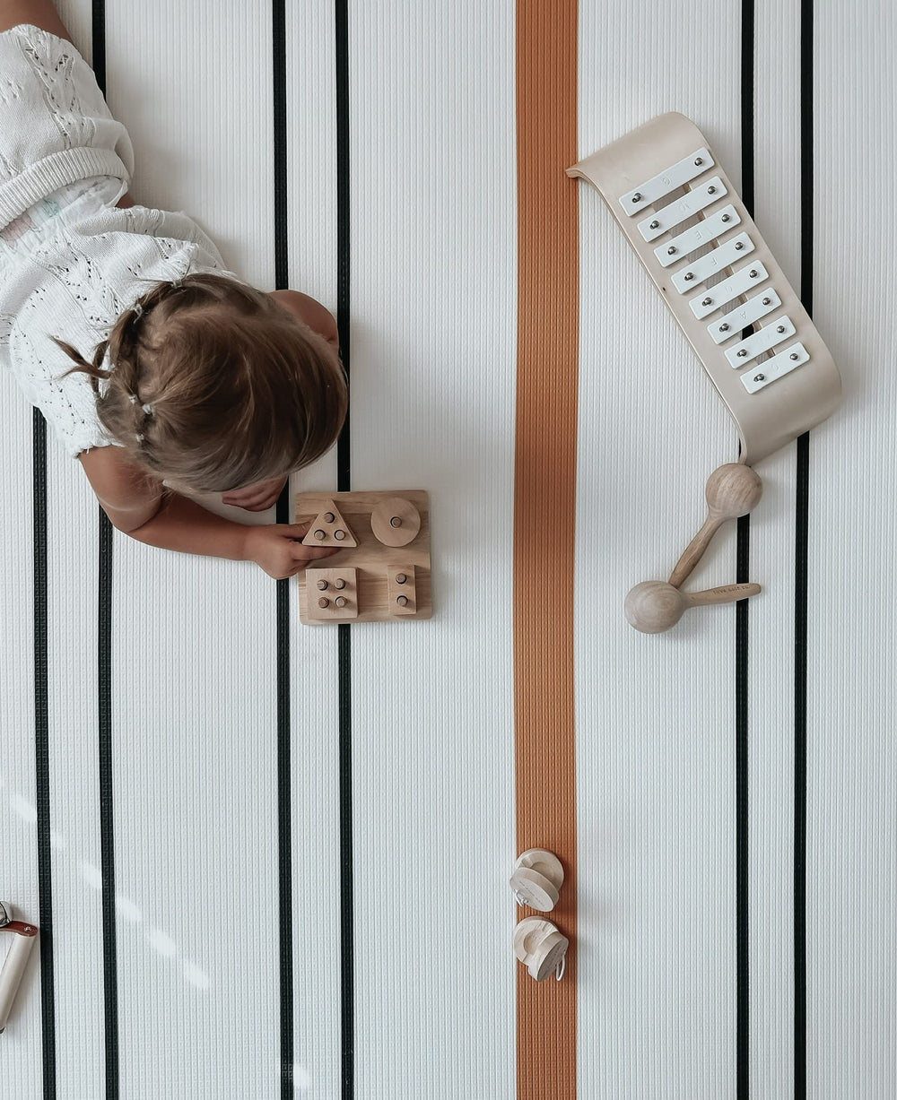 Little Bot Ofie mat room layout; versatile play area for families.