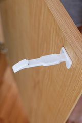 Little Chicks CK034 drawer lock in use for easy adult access.