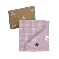 Little Dedi lavender checkered blanket on crib showing cozy swaddling potential.