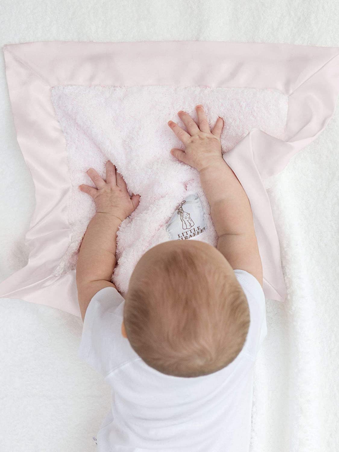 Little Giraffe Blanky satin trim detail emphasizes elegant nursery-ready design