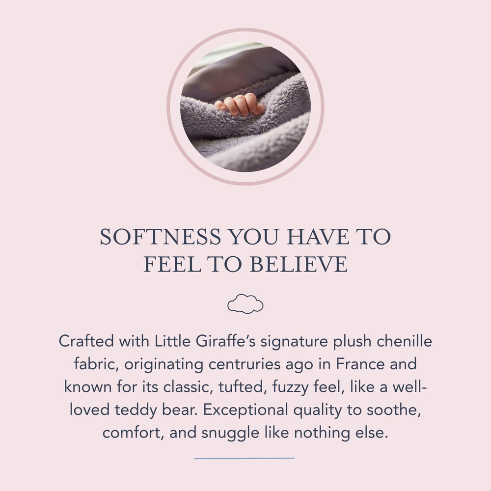 Little Giraffe Chenille blanket in nursery—gentle warmth for newborn sleep.
