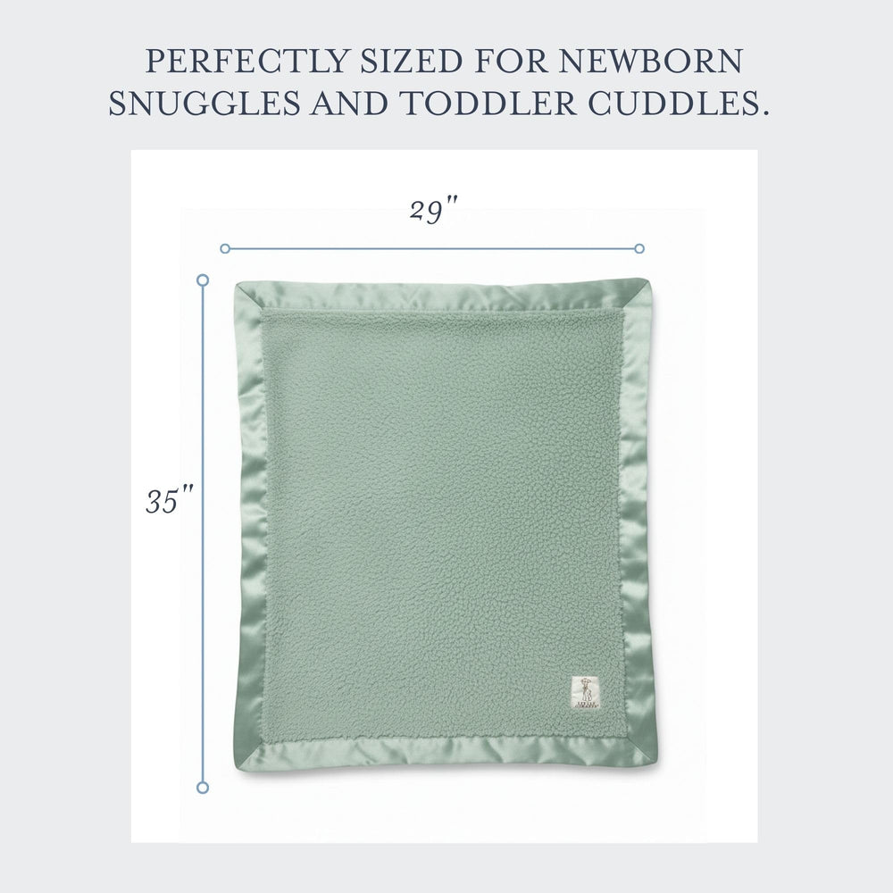 Little Giraffe chenille blanket in a nursery setting promotes comfort during naps.