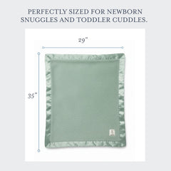 Little Giraffe chenille blanket in a nursery setting promotes comfort during naps.