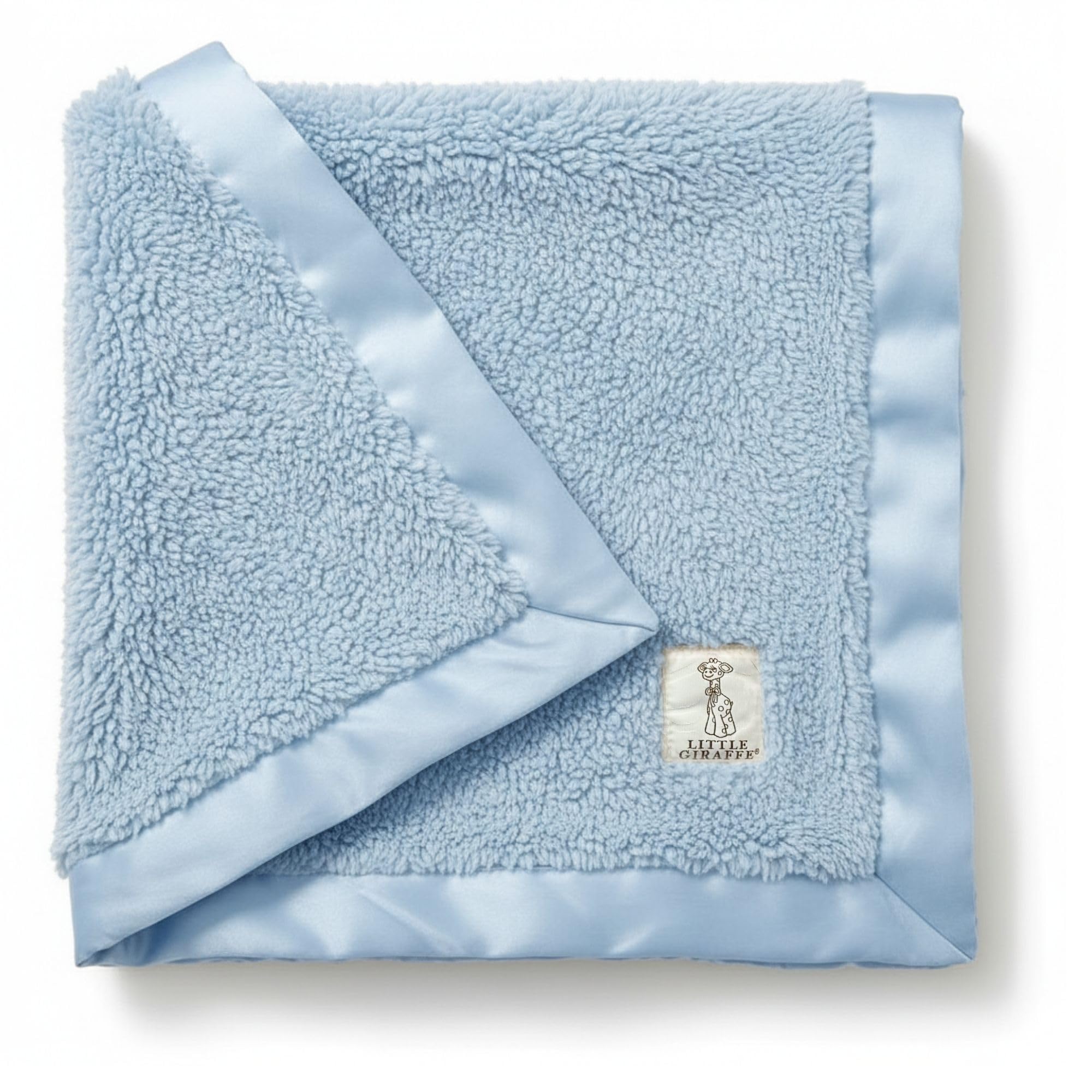 Little Giraffe chenille blanket blue folded offers cozy warmth for newborn snuggles.