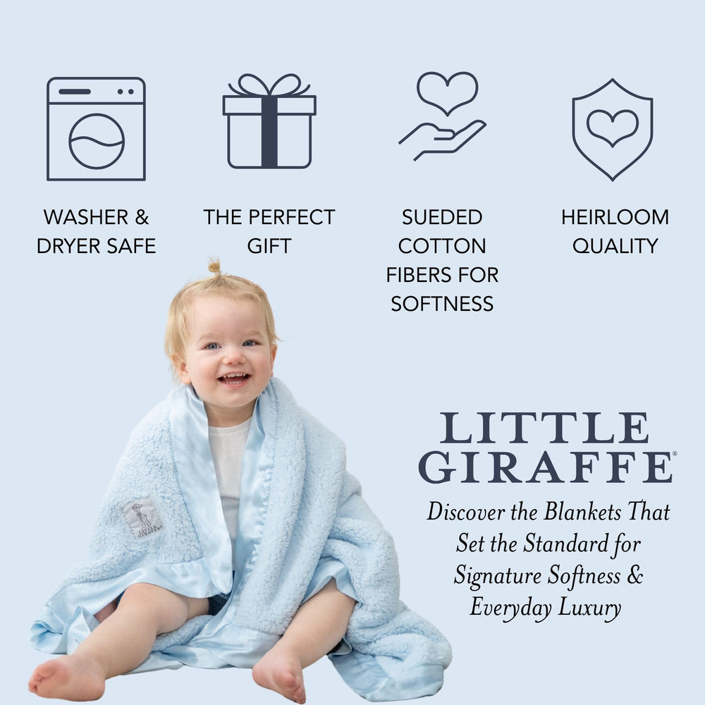 Little Giraffe chenille blanket blue nursery decor pairing adds warmth and style.
