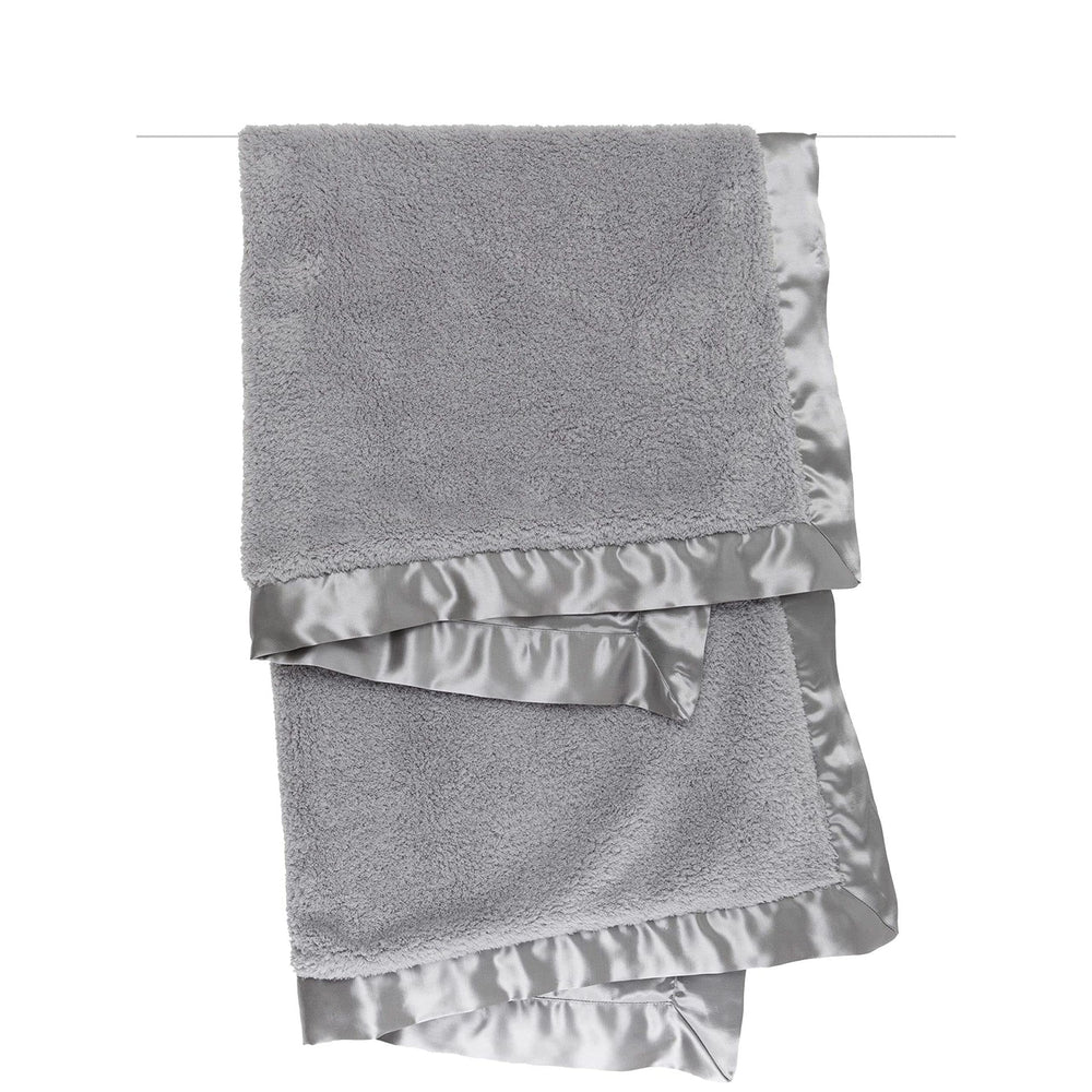 Little Giraffe chenille satin blanket folded image showcases compact size for easy nursery storage.