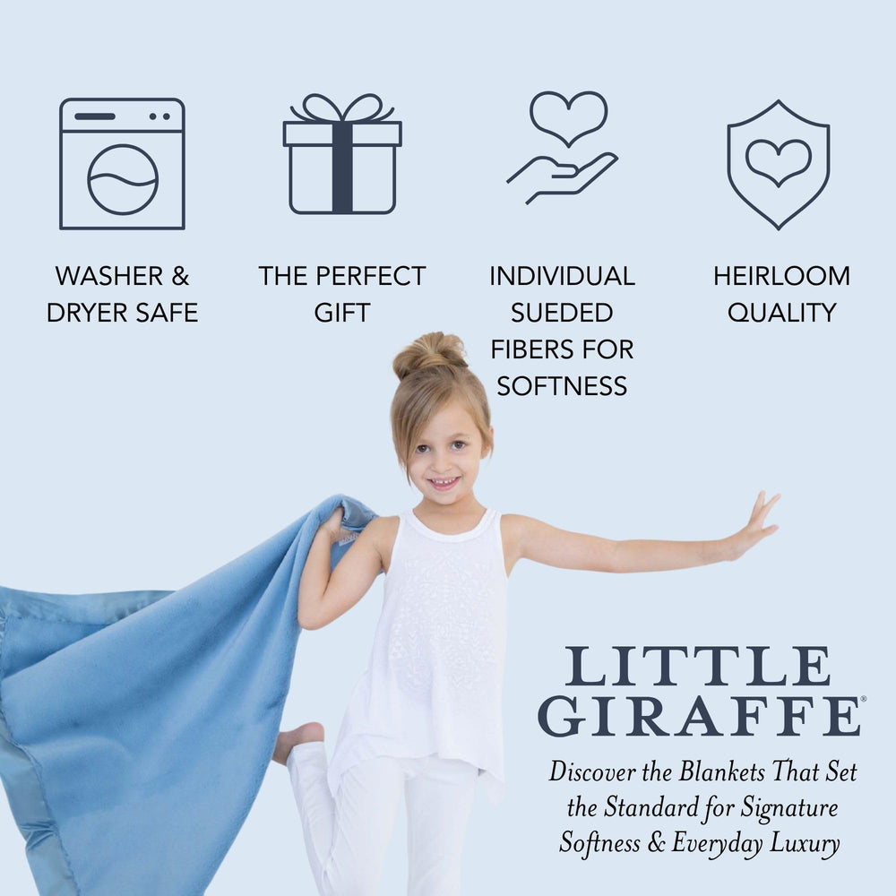 Little Giraffe Luxe blanket folded in a gift-ready presentation
