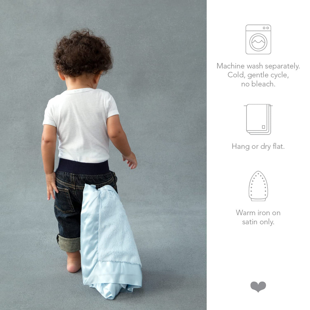 Little Giraffe Luxe mini blanky baby hands use close-up showing portable security.