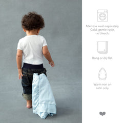 Little Giraffe Luxe mini blanky baby hands use close-up showing portable security.