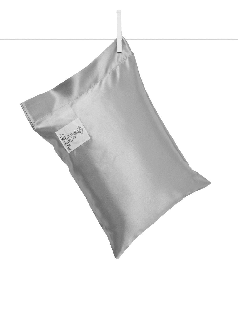 Little Giraffe satin decor pillow in silver with plush feather yarn knit for cozy nursery decor